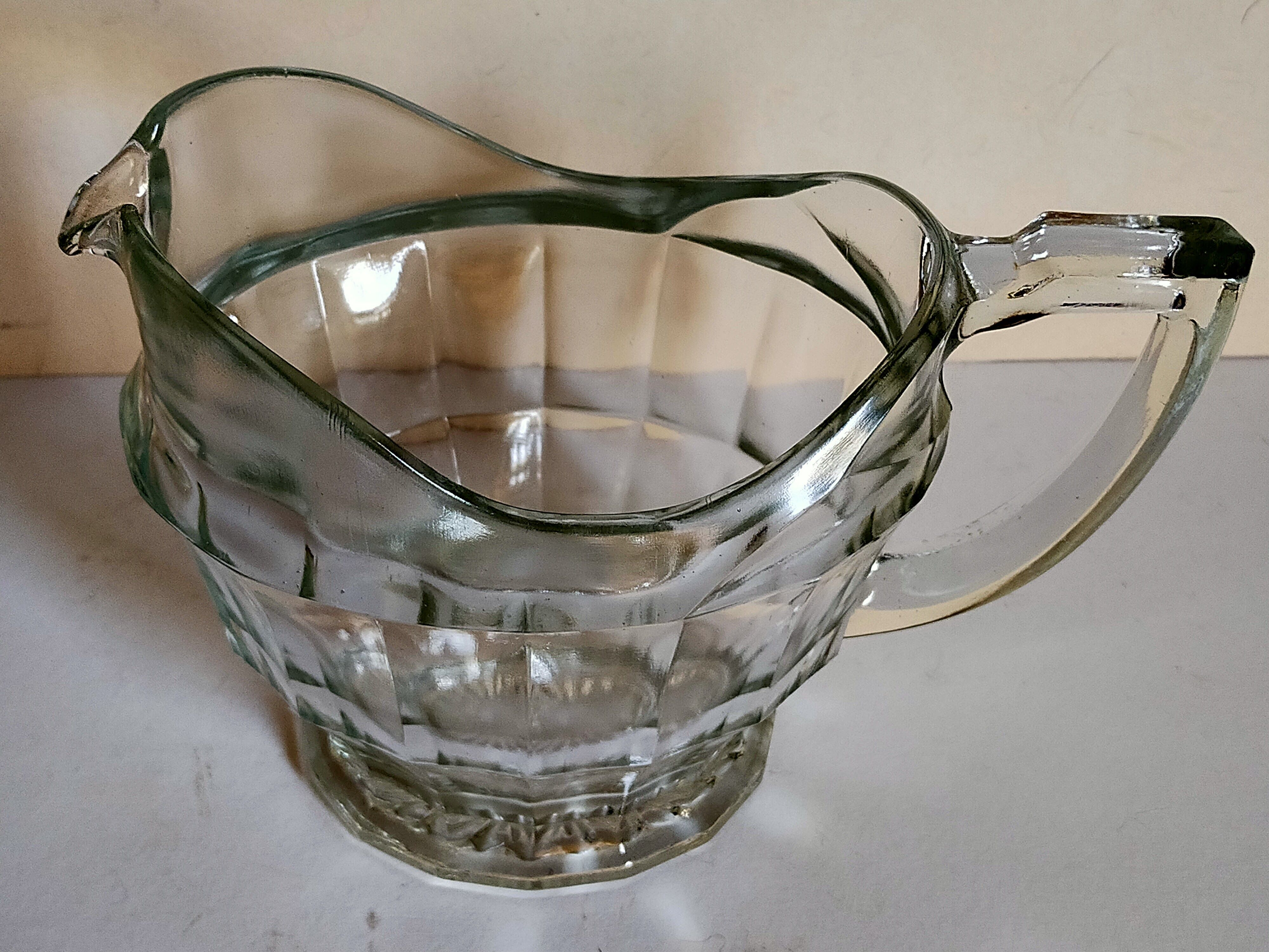 Art deco table pitcher in moulded glass 1940
