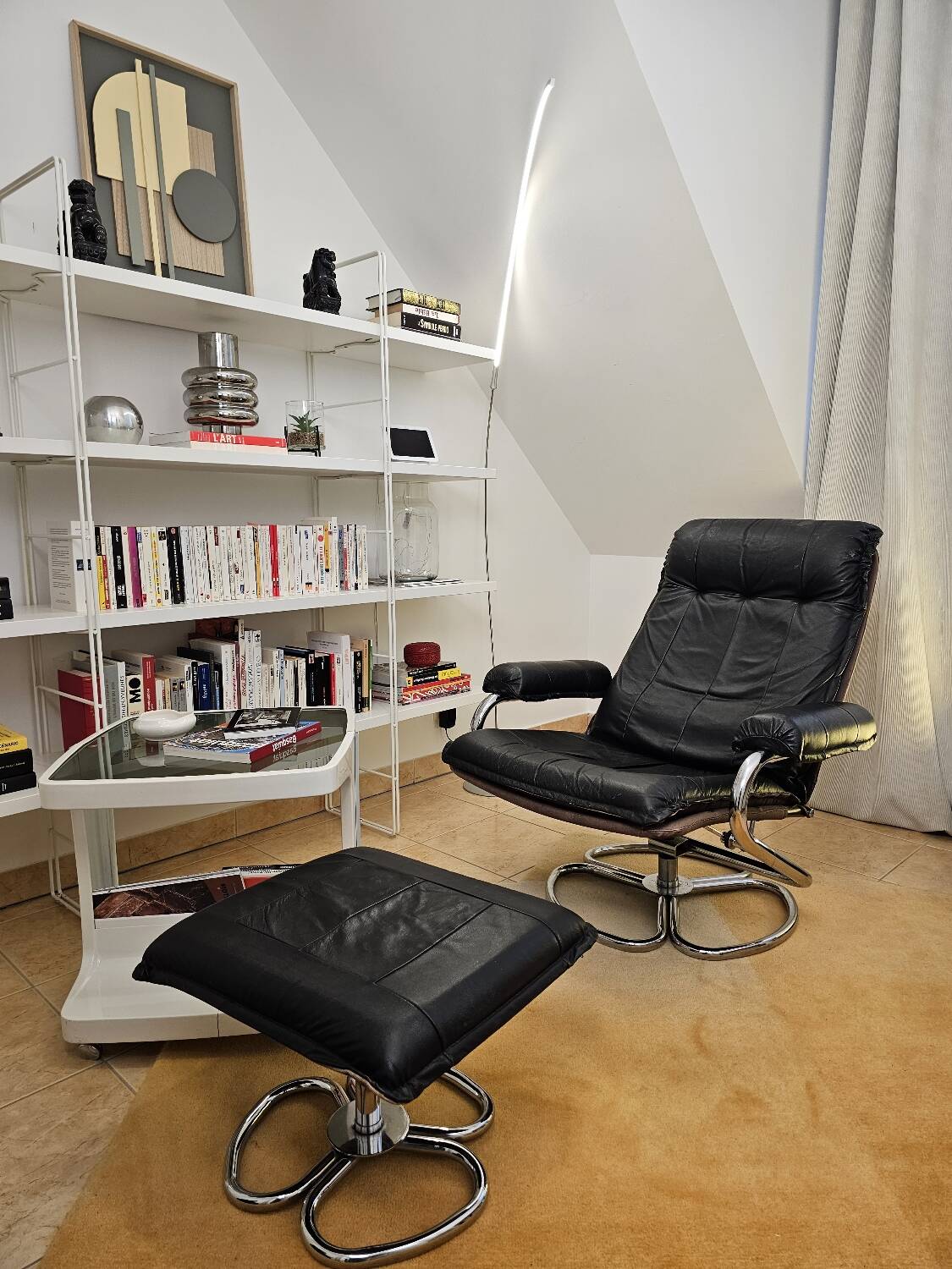 Fauteuil cuir et son ottoman