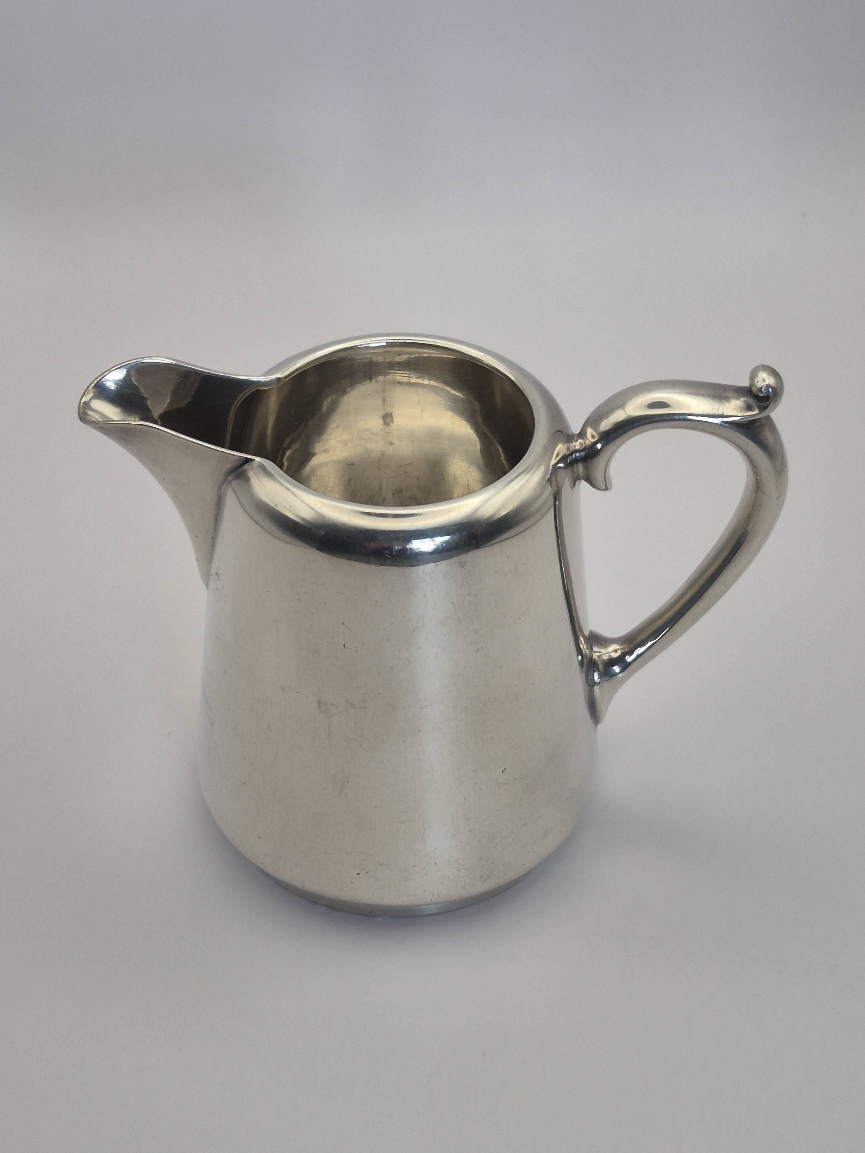 Superb vintage cream jug from the prestigious silversmithing house.