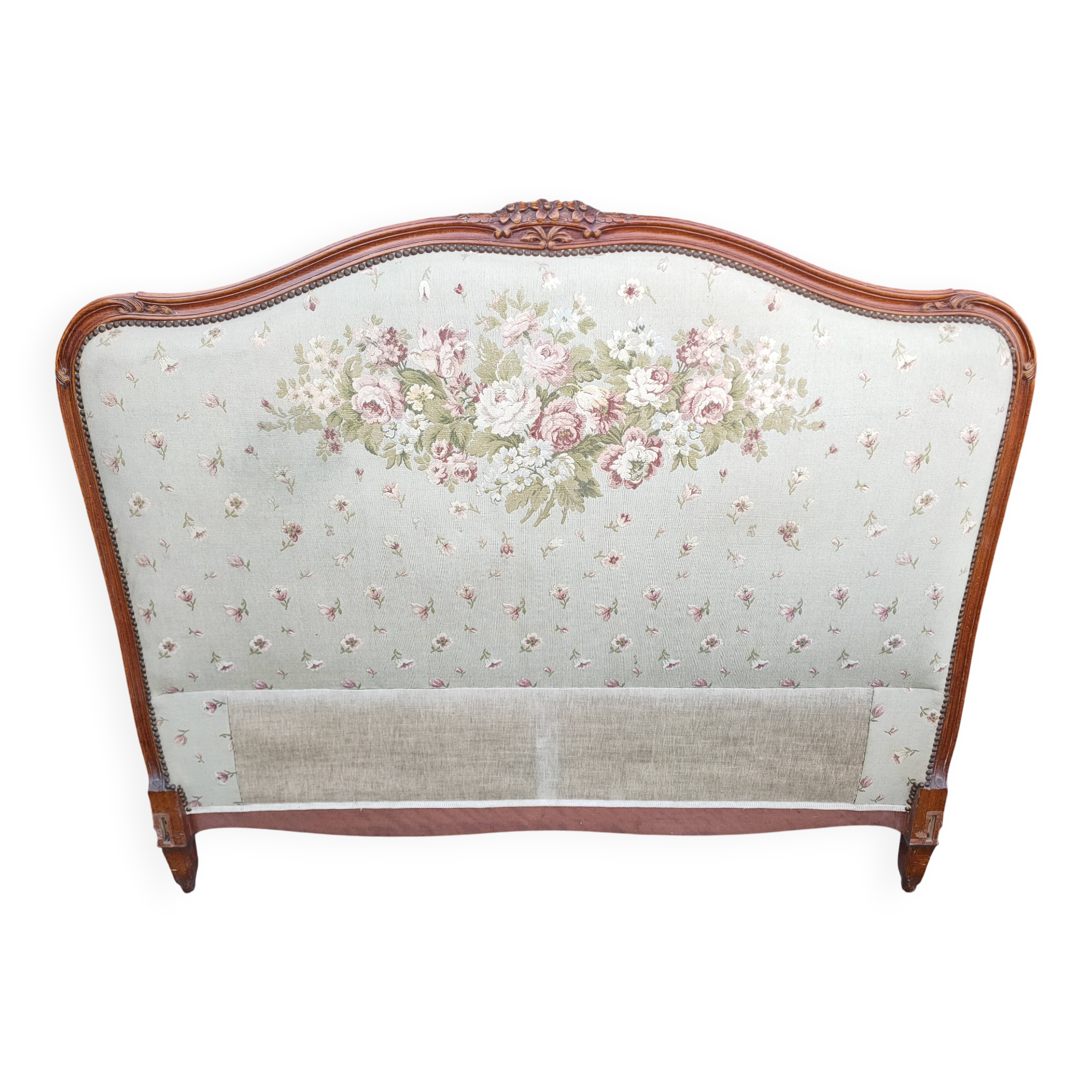 antique fabric and wood headboard