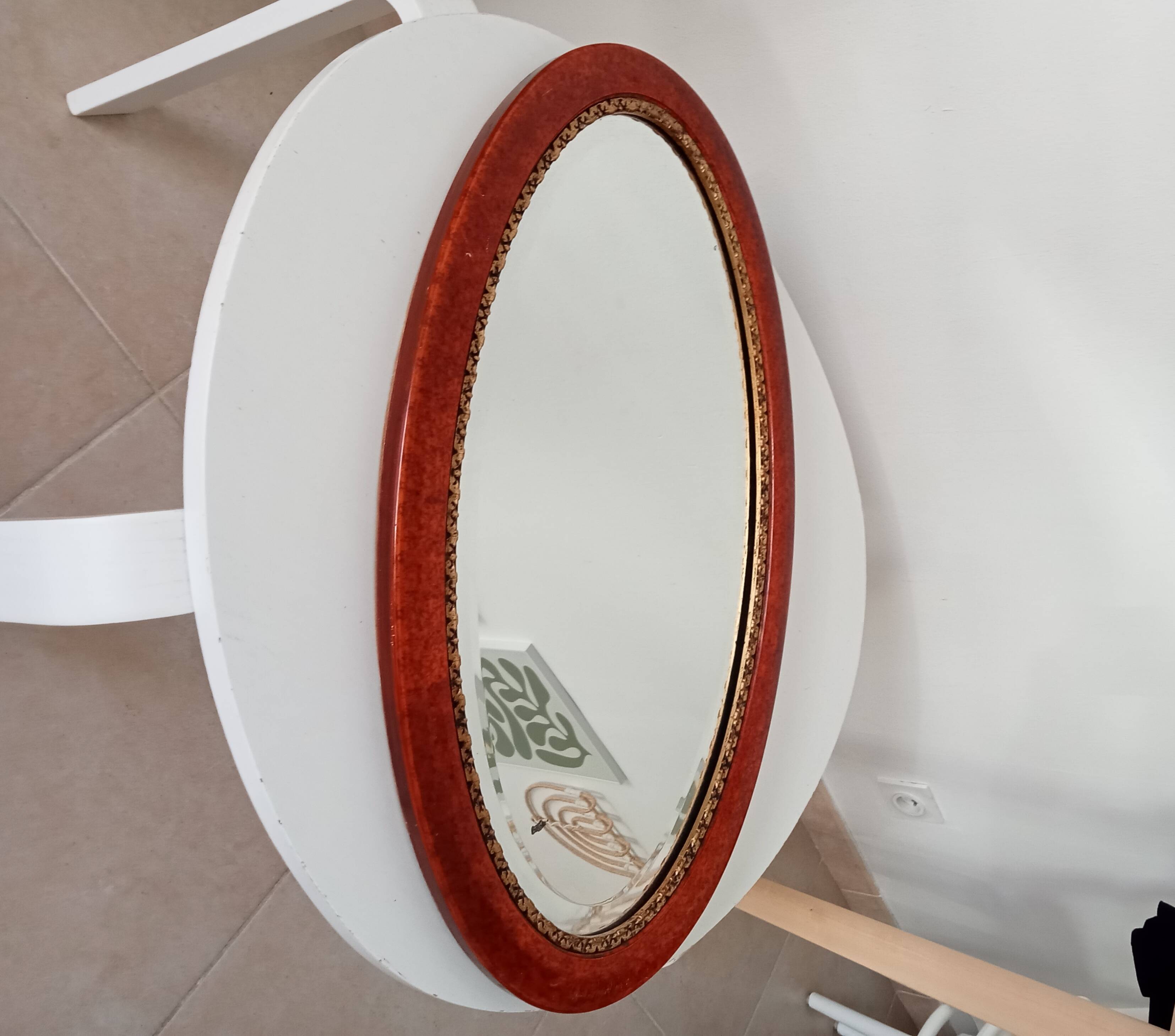 Antique oval mirror with bevelled glass
