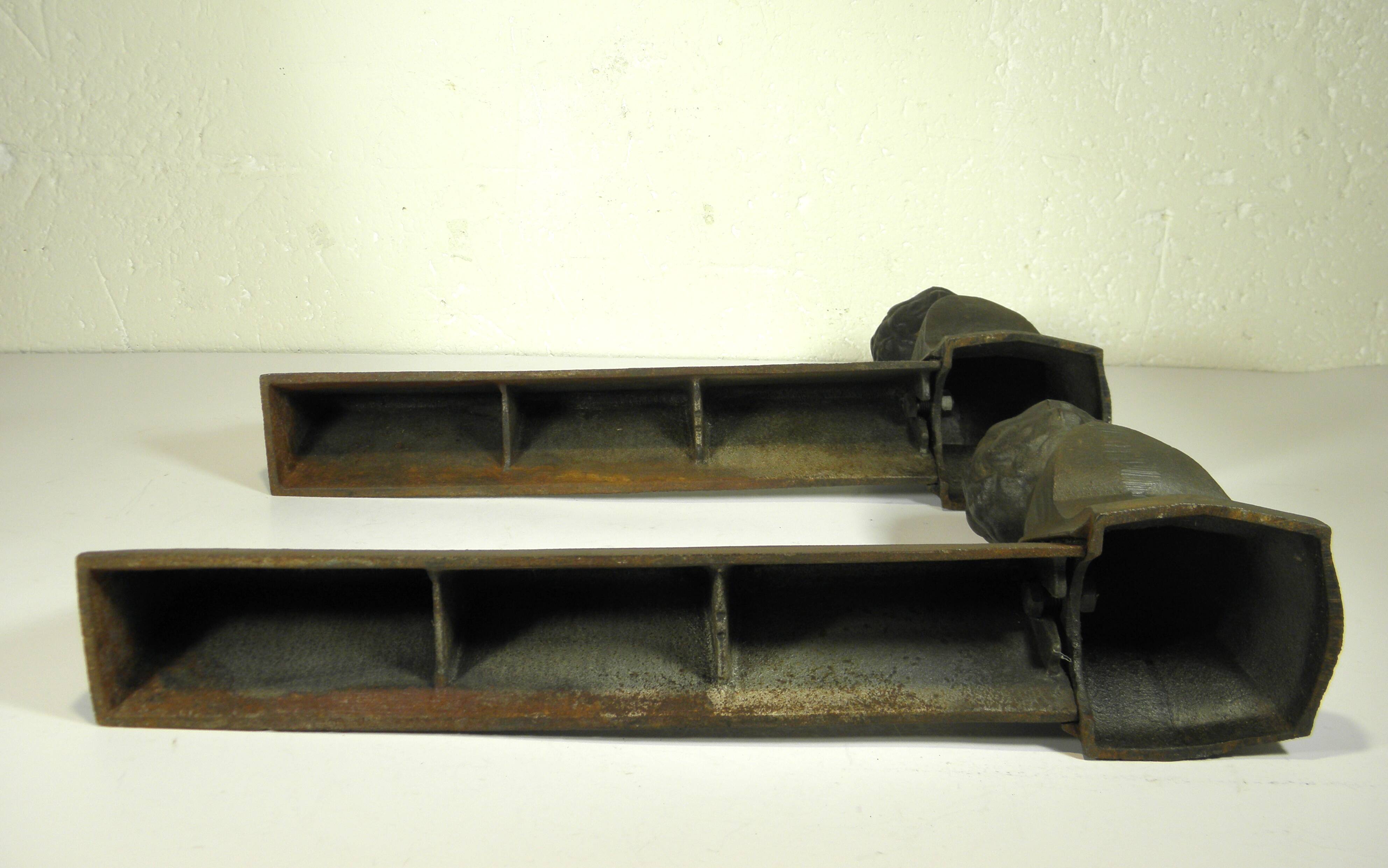 Pair of cast iron fire dogs