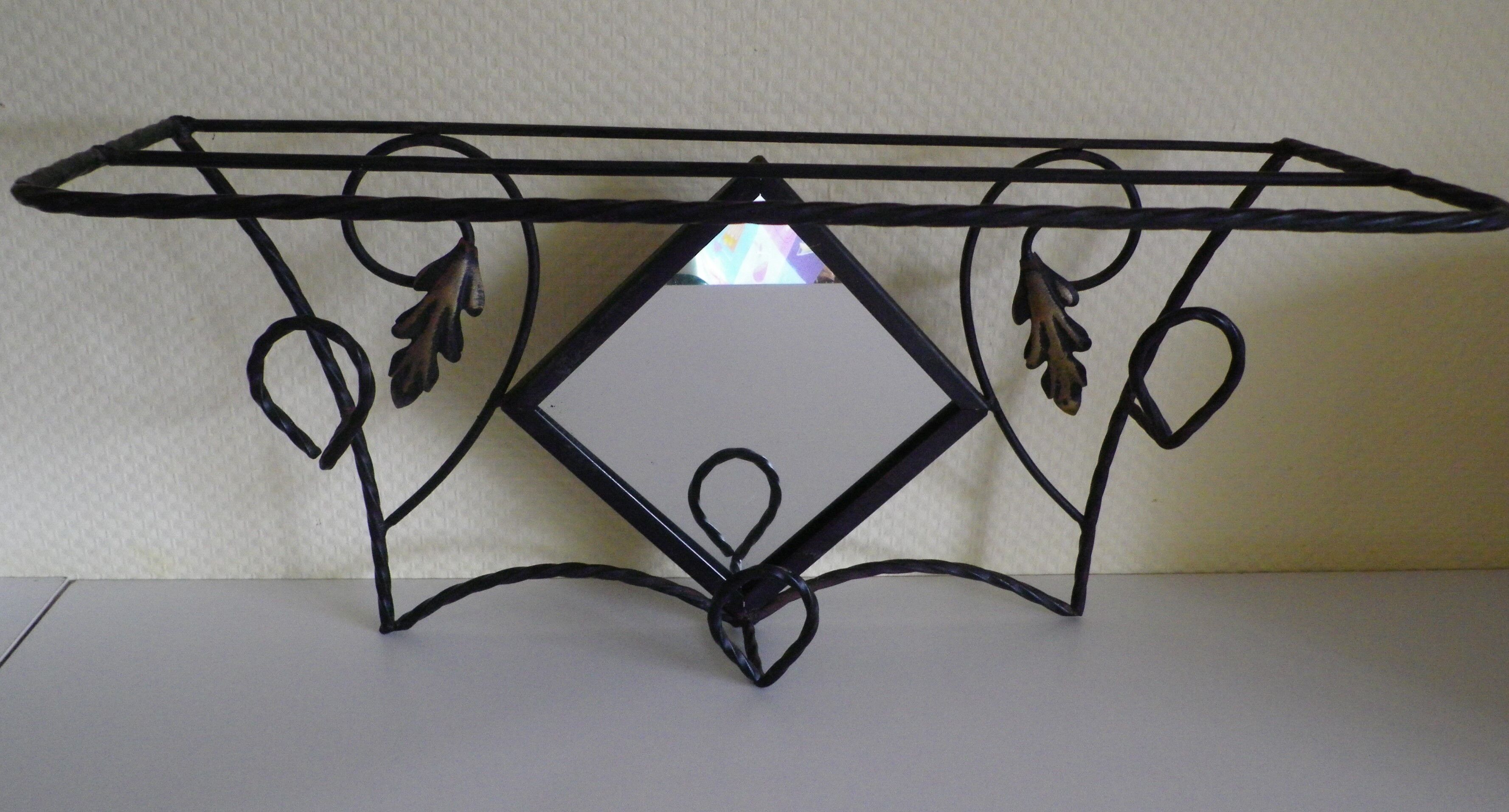 Wrought iron wall holder with top support and built-in mirror