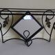 Wrought iron wall holder with top support and built-in mirror