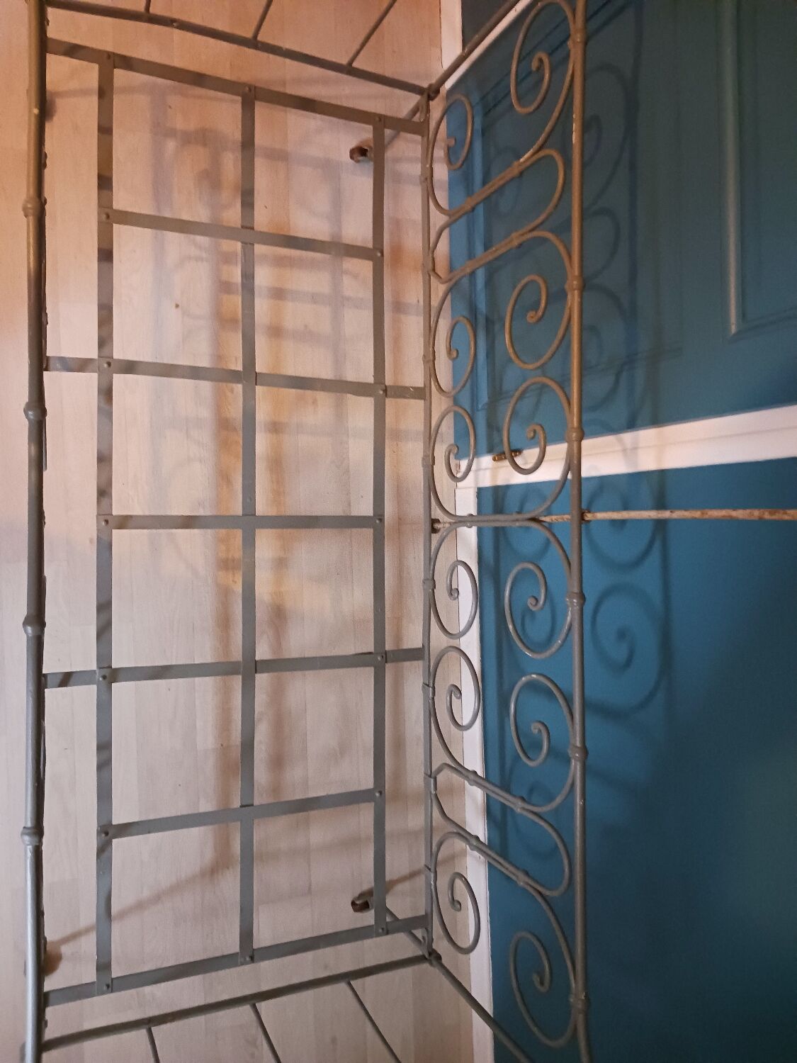 Wrought iron children's bed from the late 19th century.