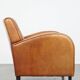 Characteristic sheepskin design armchair in beautiful warm cognac colours