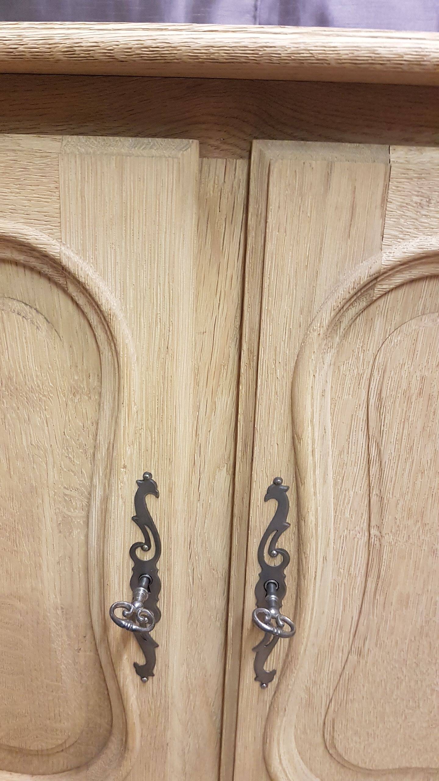 Old 2-door chest of drawers in air-coated oak, to be painted or varnished.