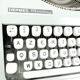 Hermes Baby Cursive green lime maker typewriter