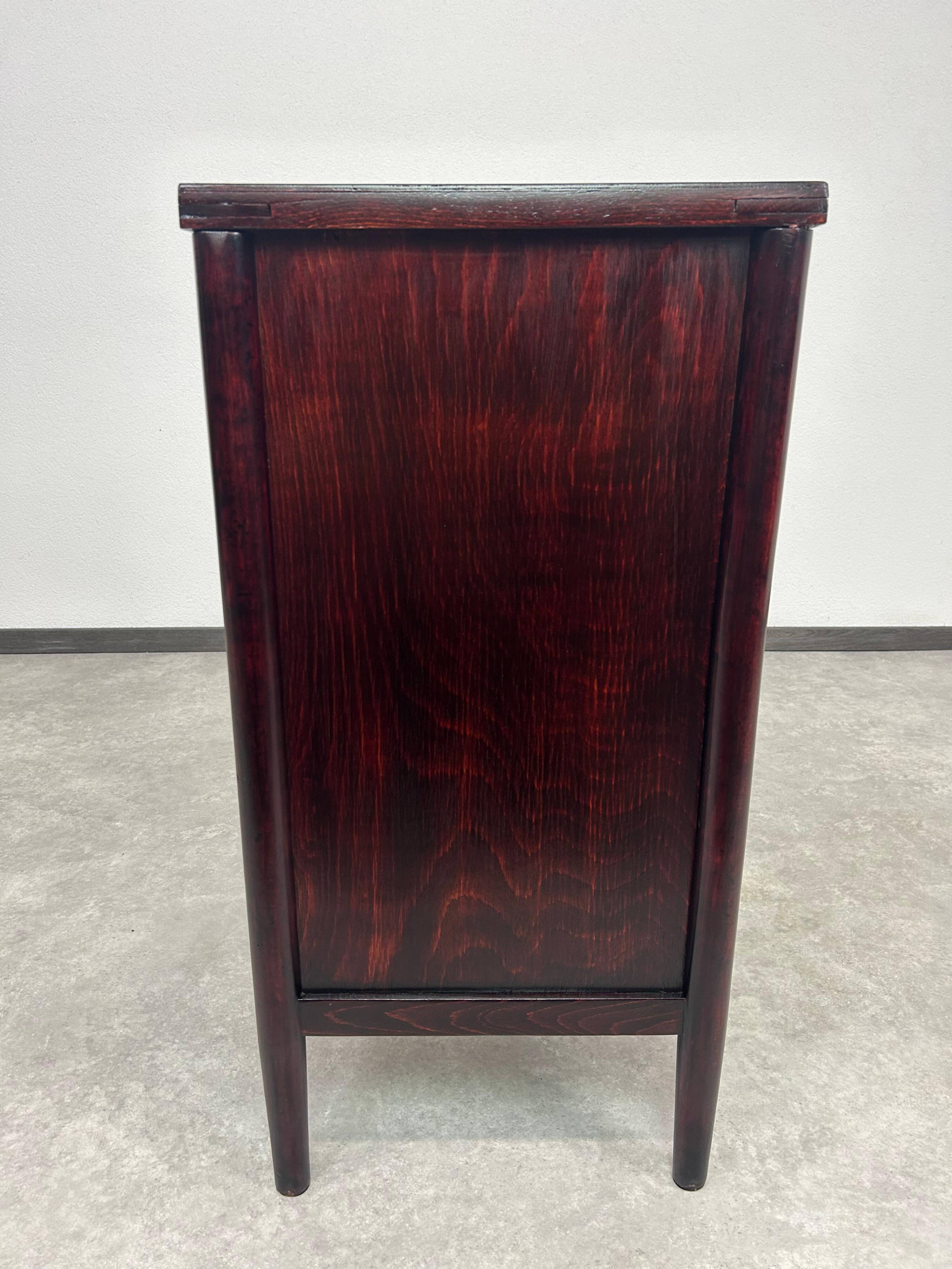 Secession bedside table by J&J Kohn