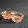 Salt shaker and pepper shaker in pink glass