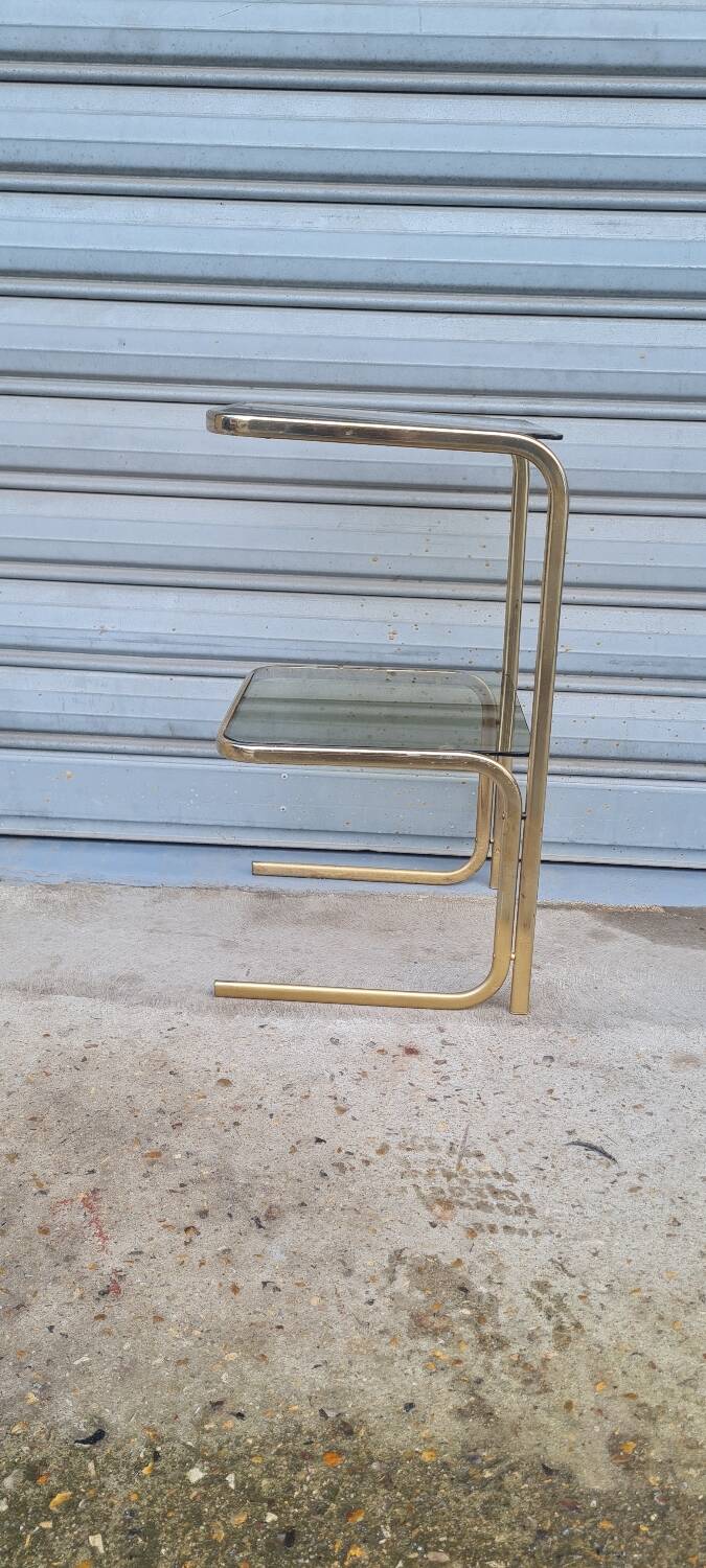 End table in gold metal and smoked glass