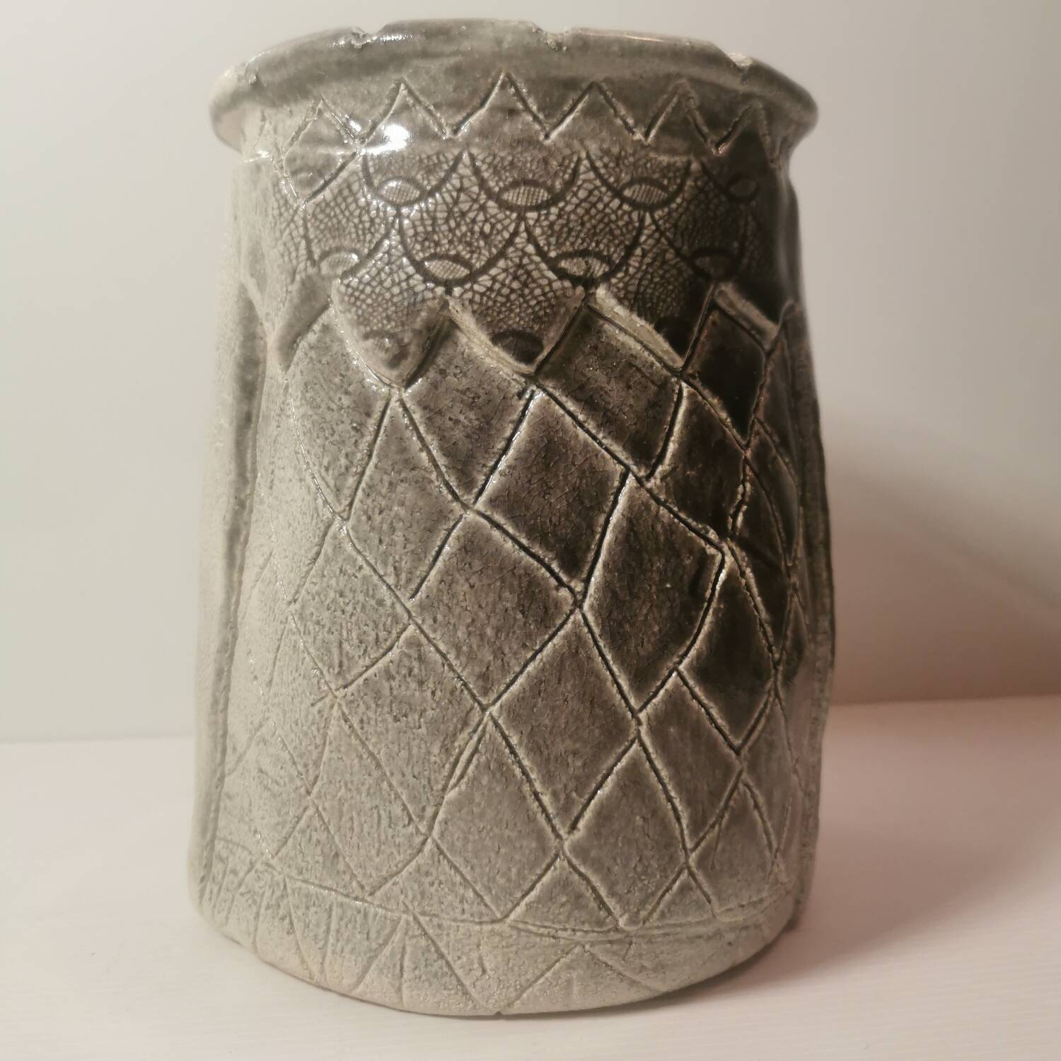 Ceramic vase or pot in gray beige color