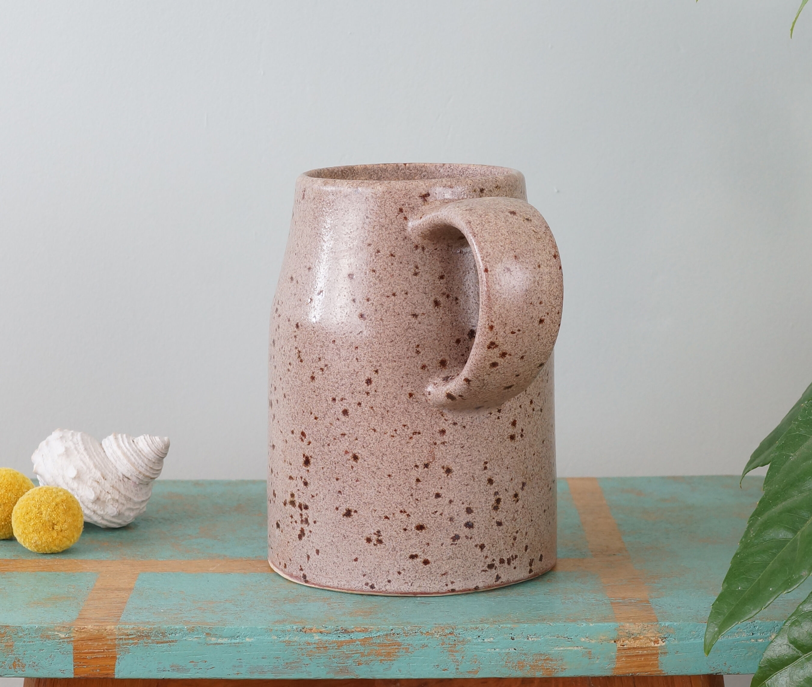 Pyrite sandstone pitcher stamped "Roman", 70s