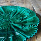 Plate with botanical leaves in green enameled earthenware from Clairfontaine circa 1890