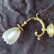 Bronze wall light with opaque glass tulip 1900