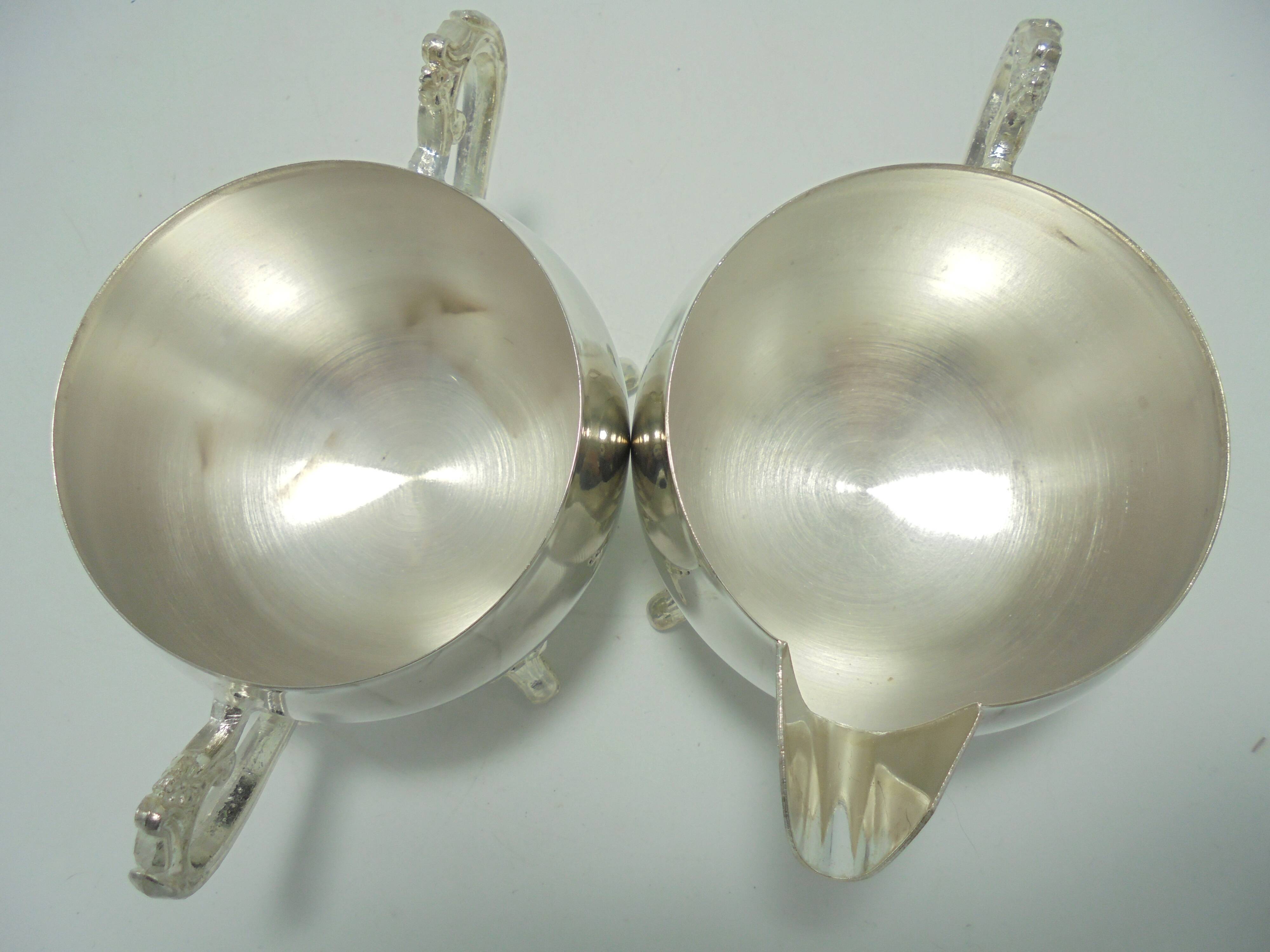 Sugar bowl and milk jar on tray