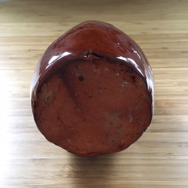 Bottle of chocolate brutalist vase