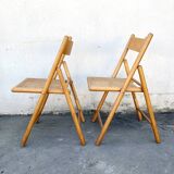 Pair of folding chairs with cane seat