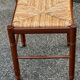 Paire de tabourets années 50 en bois et assise paillée
