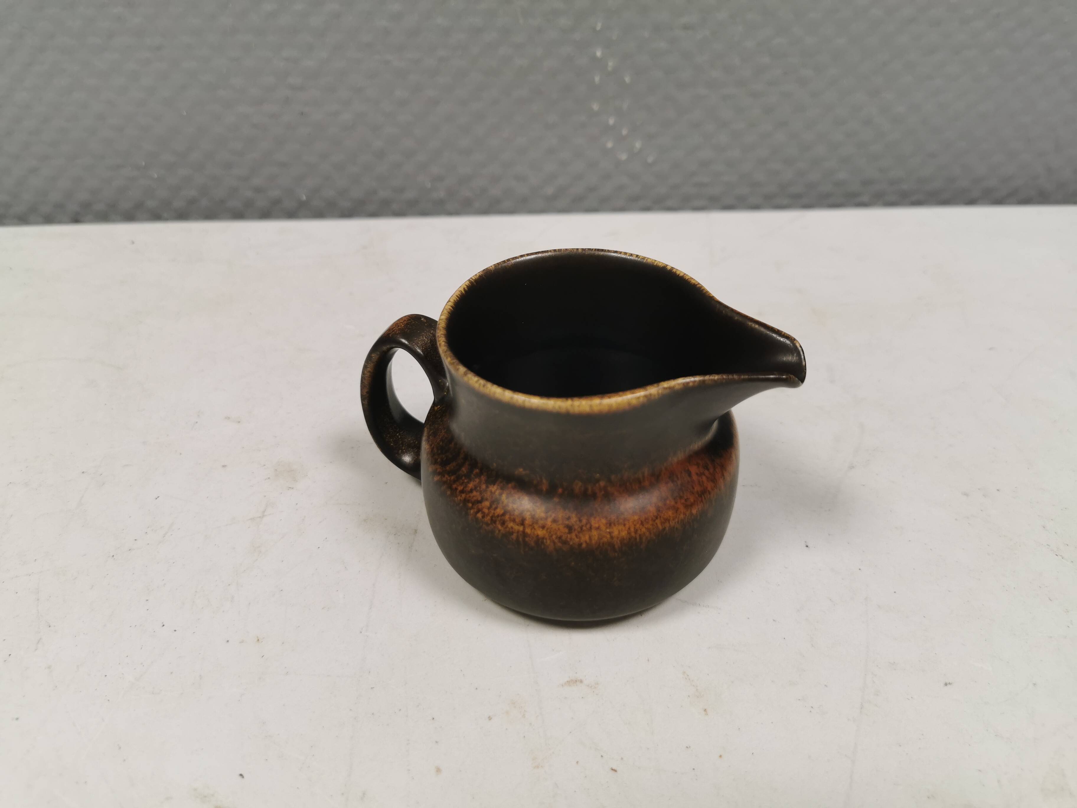 Very nice cream jug in hare fur glaze, Danish and from the 1970-80s.