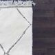 Berber rug with hollow diamonds