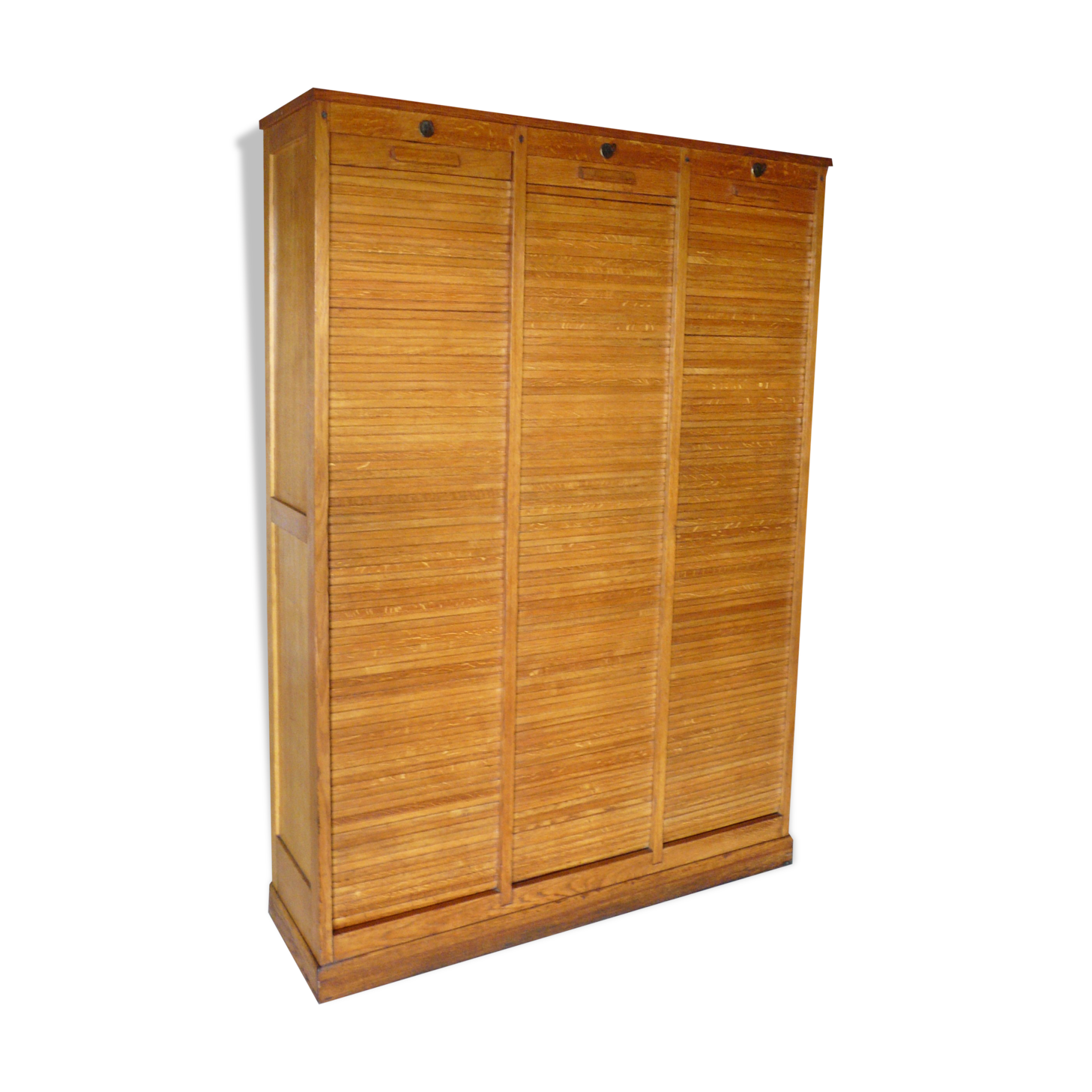 Furniture filing three curtains in oak 50s