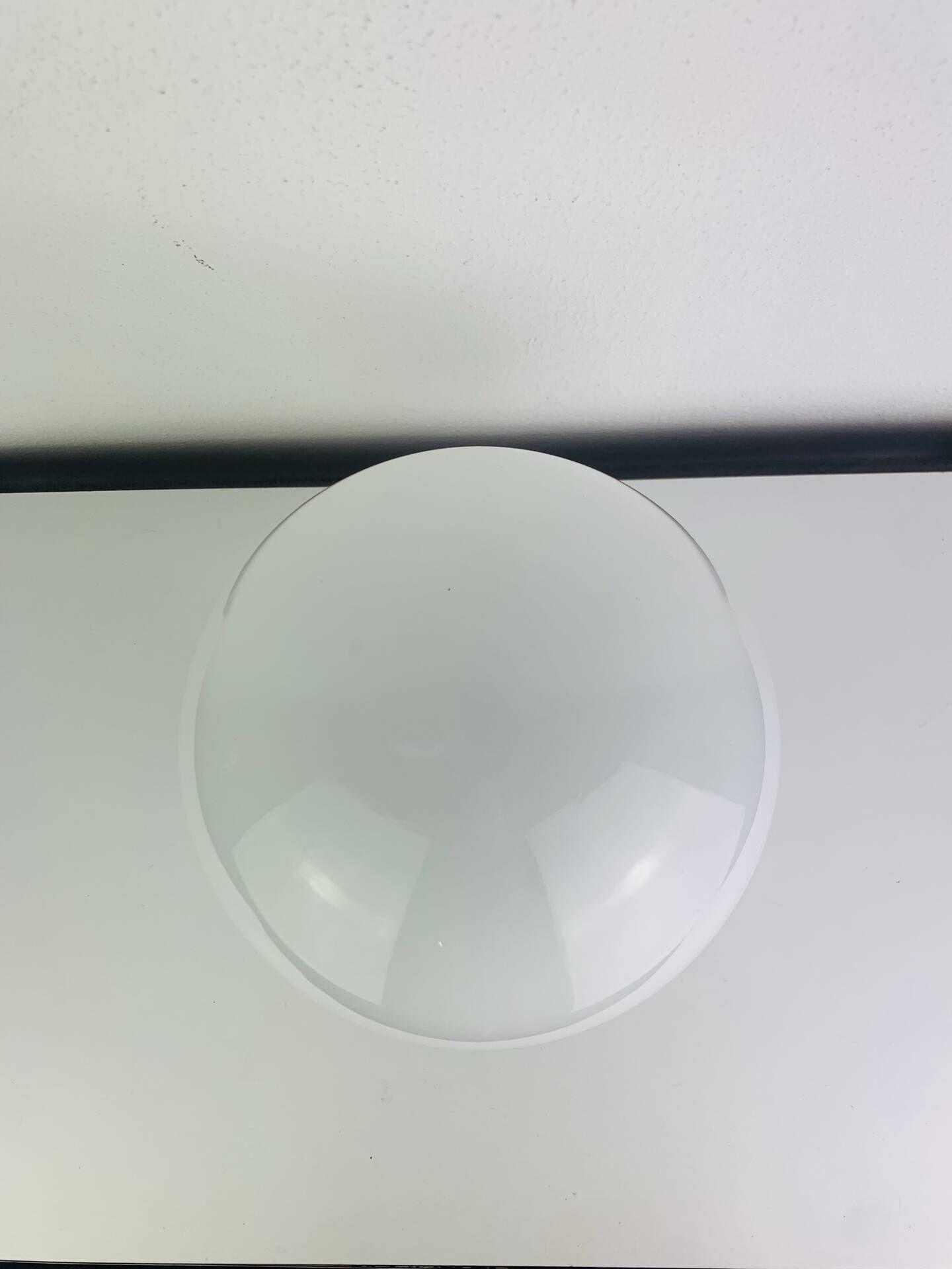 Wall light or ceiling light with opaline globe in Art Deco style.