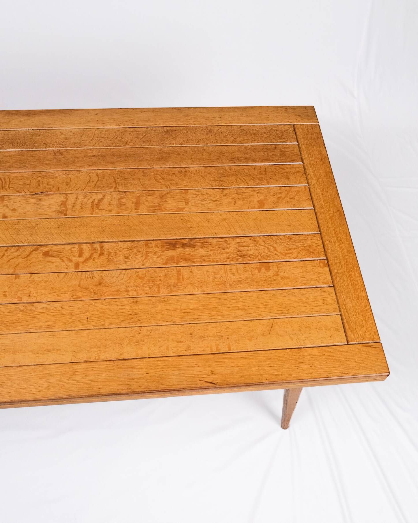 Extendable oak table in the style of Guillerme and Chambron, France 1960s
