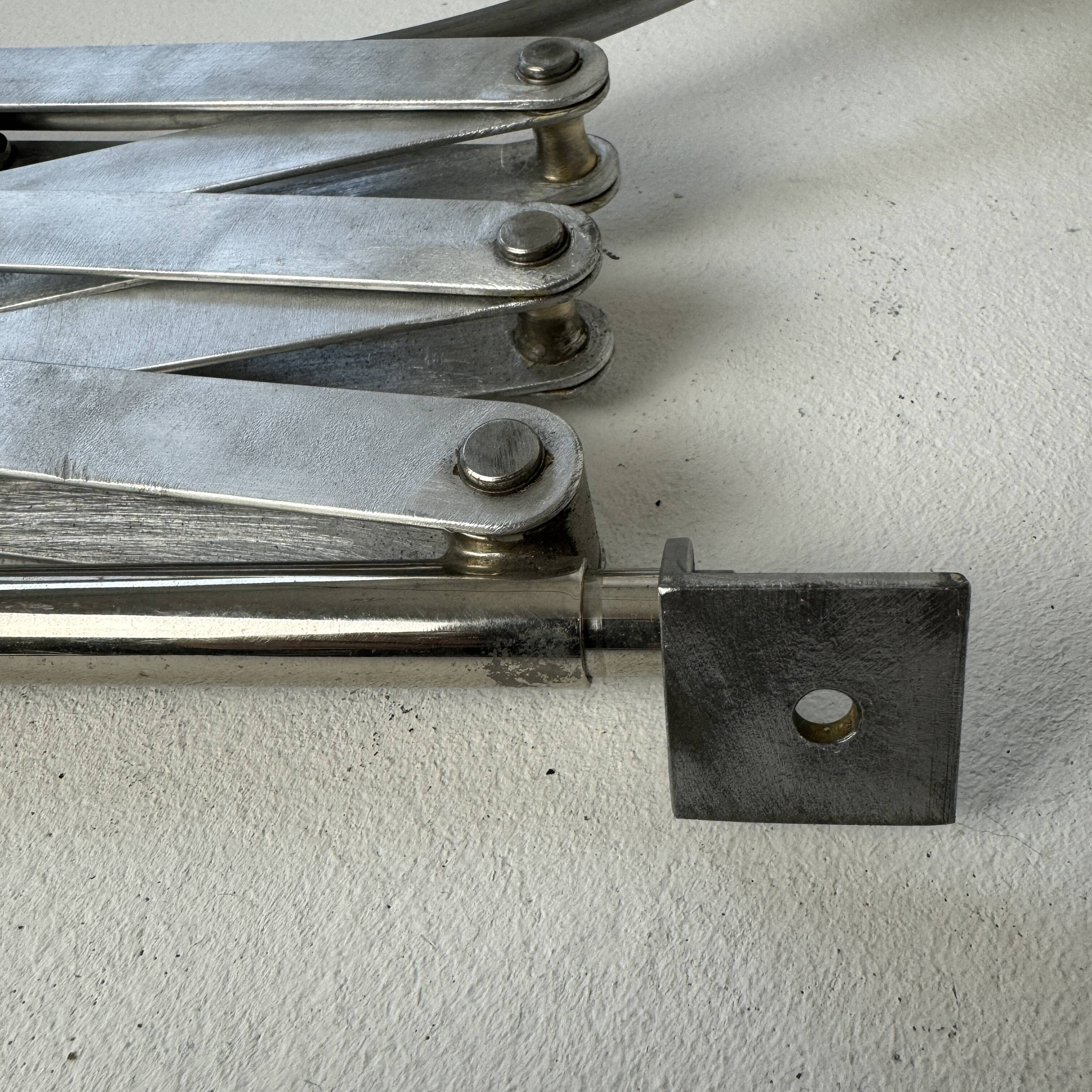 Old large industrial accordion wall lamp