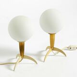 Two Mid-Century Modern rocket table lamps in brass and glass