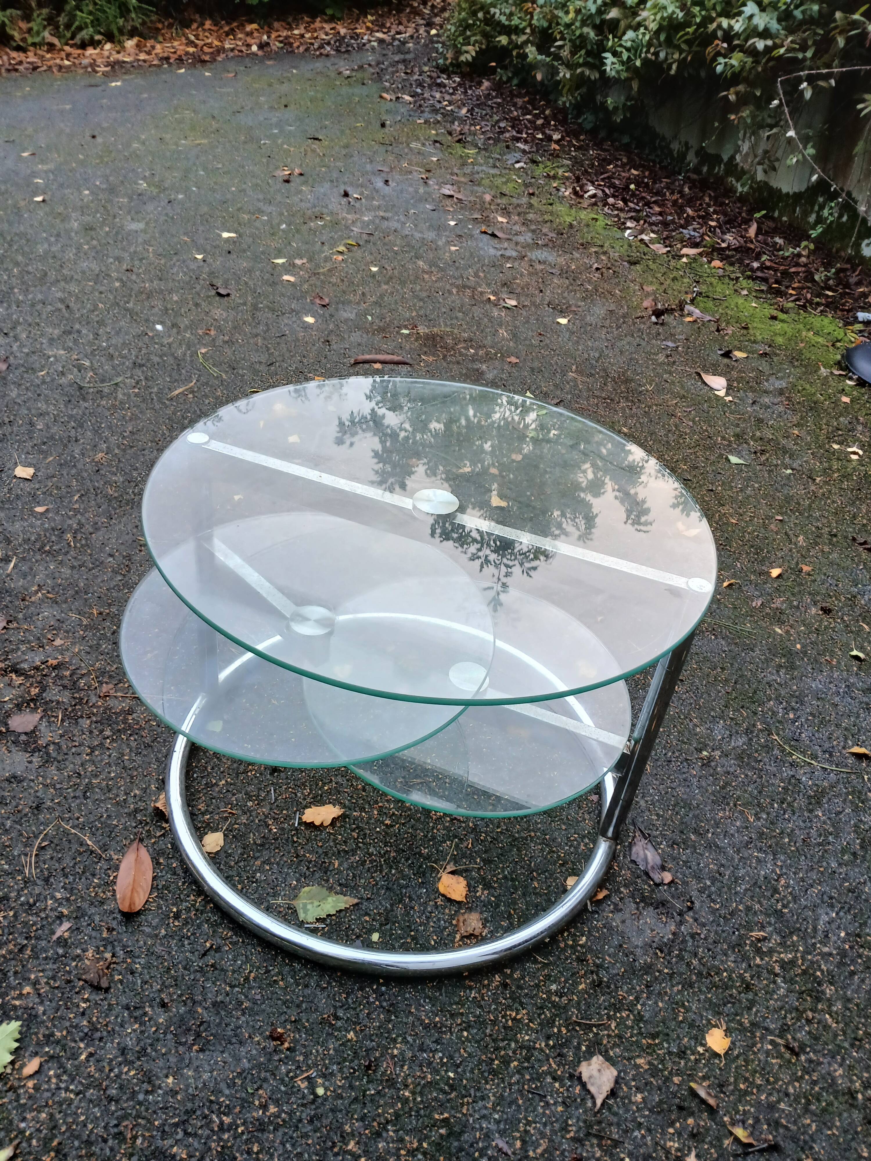 Old chrome metal coffee table with swivel tops from the 70s