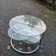 Old chrome metal coffee table with swivel tops from the 70s