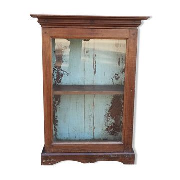 Old wardrobe with glass door