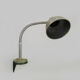 Old industrial articulated lamp with vice. Year 50