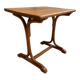 Small side table or bistro serving table with curved wood.