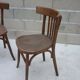 Pair of old bistro chairs with dark patina