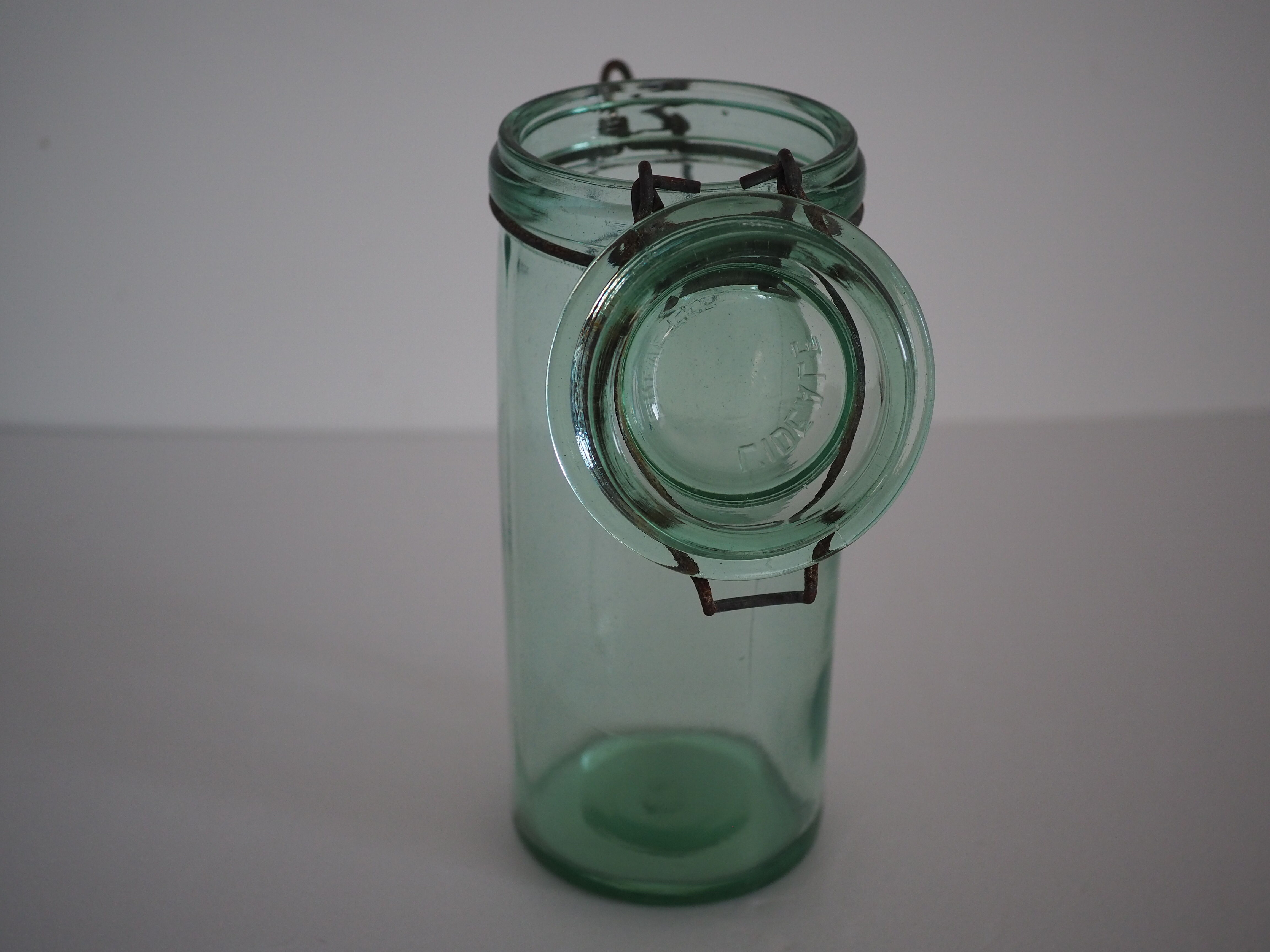 Green "ideale" glass canning jar