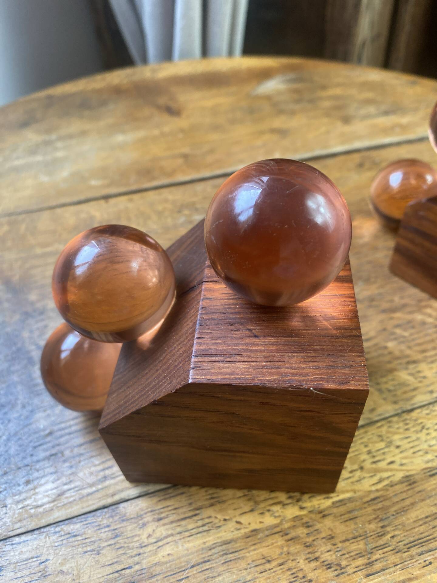 Wooden bookends and spherical glass balls