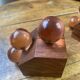 Wooden bookends and spherical glass balls