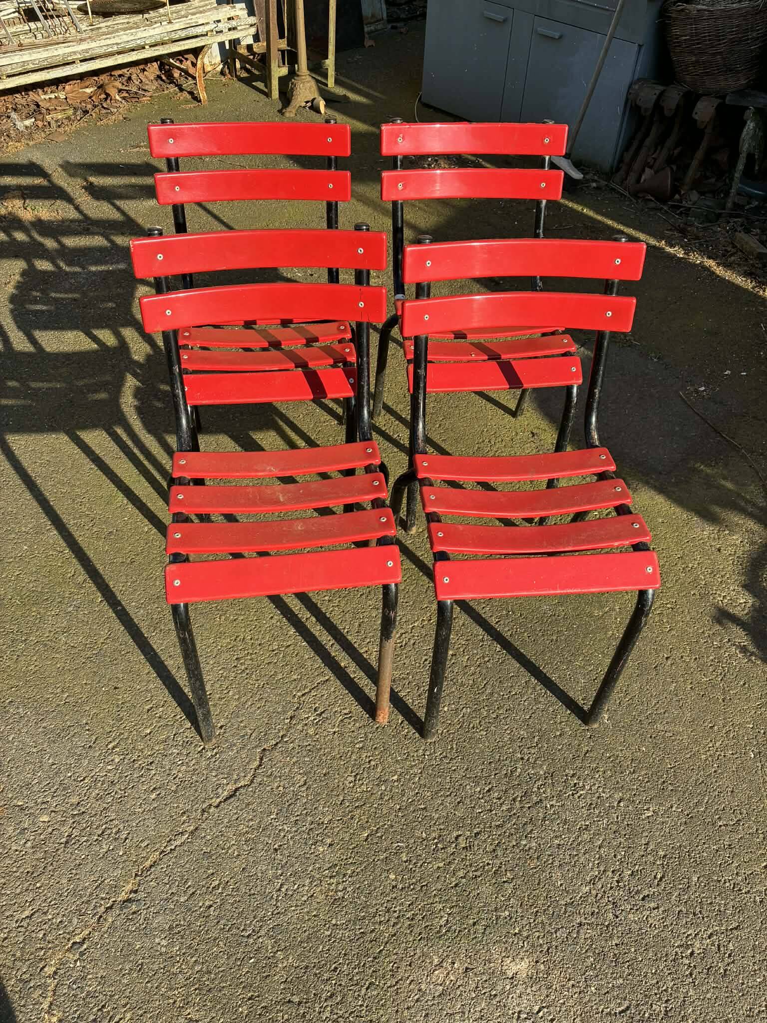 Set of 4 red and black garden chairs