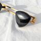 COAT RACK in gold metal and 3 black triangular PATERES circa 1960 Vintage