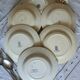 Old mismatched hollow plates in iron earth earthenware