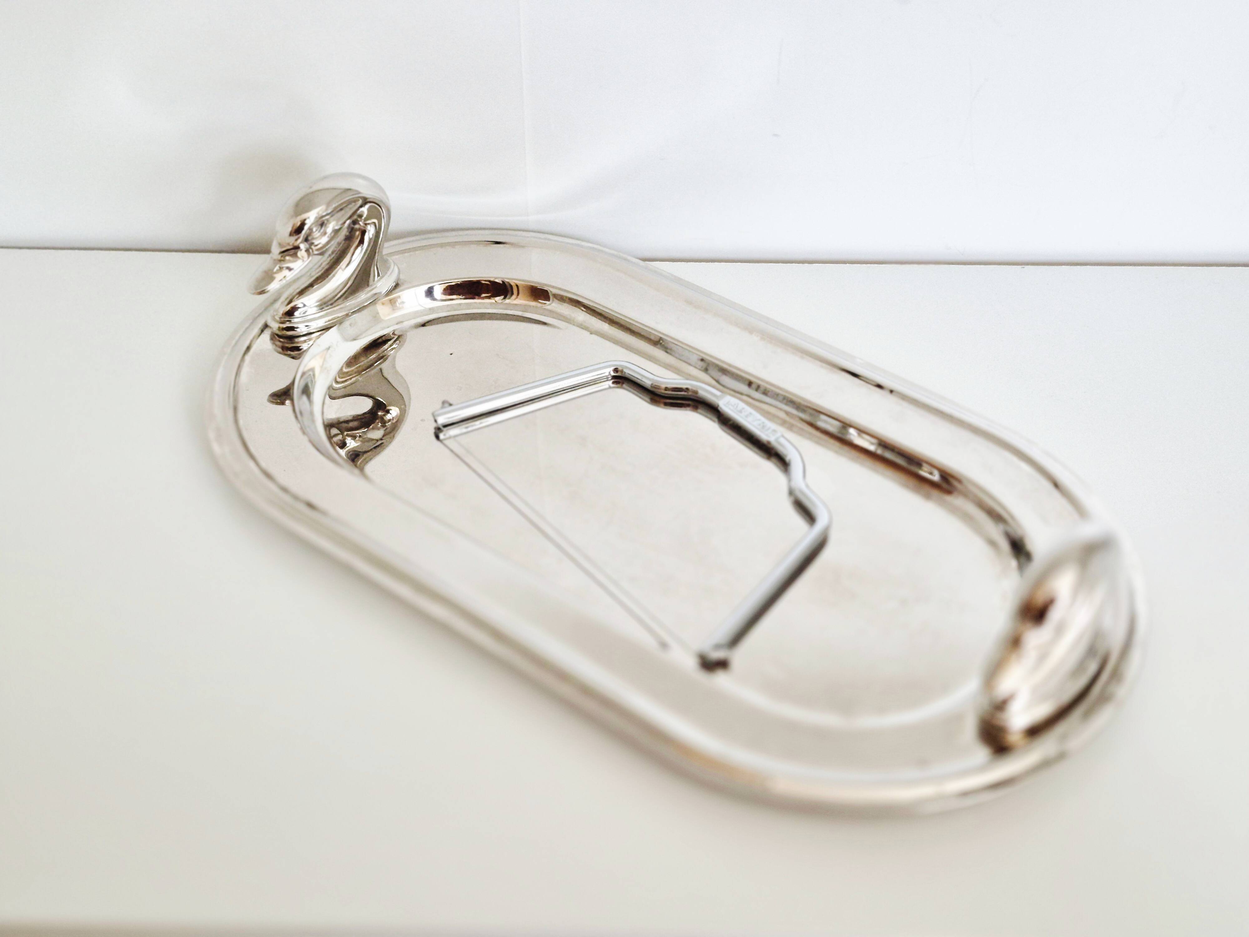 Silver-plated serving dish for foie gras.