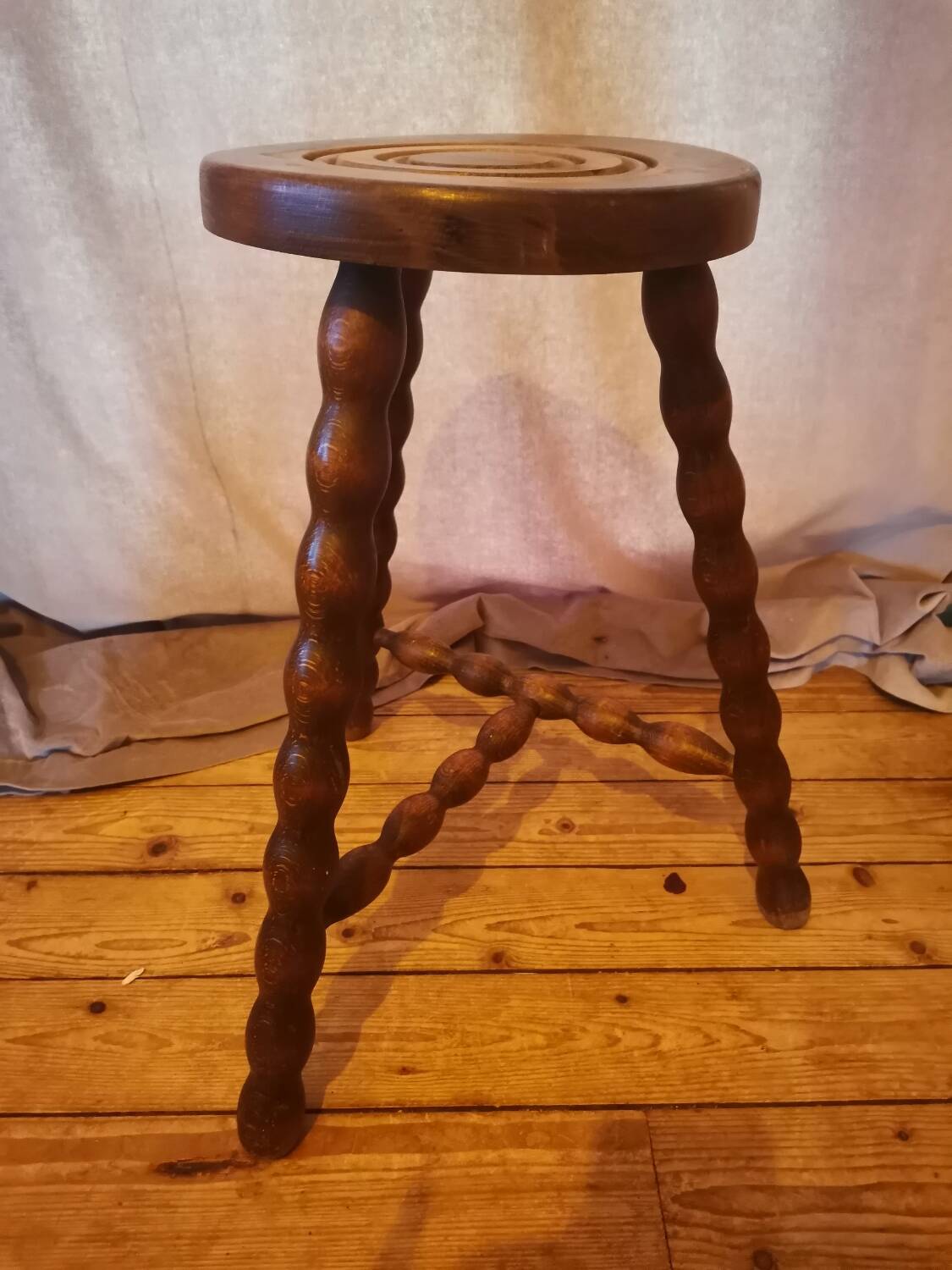 Turned wood tripod stool