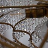 Old chandelier with tassels and brass