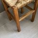 Wooden stool with straw seat