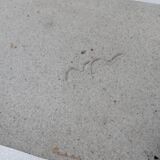 Signed sandstone top