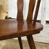 4 wooden chairs with brutalist design