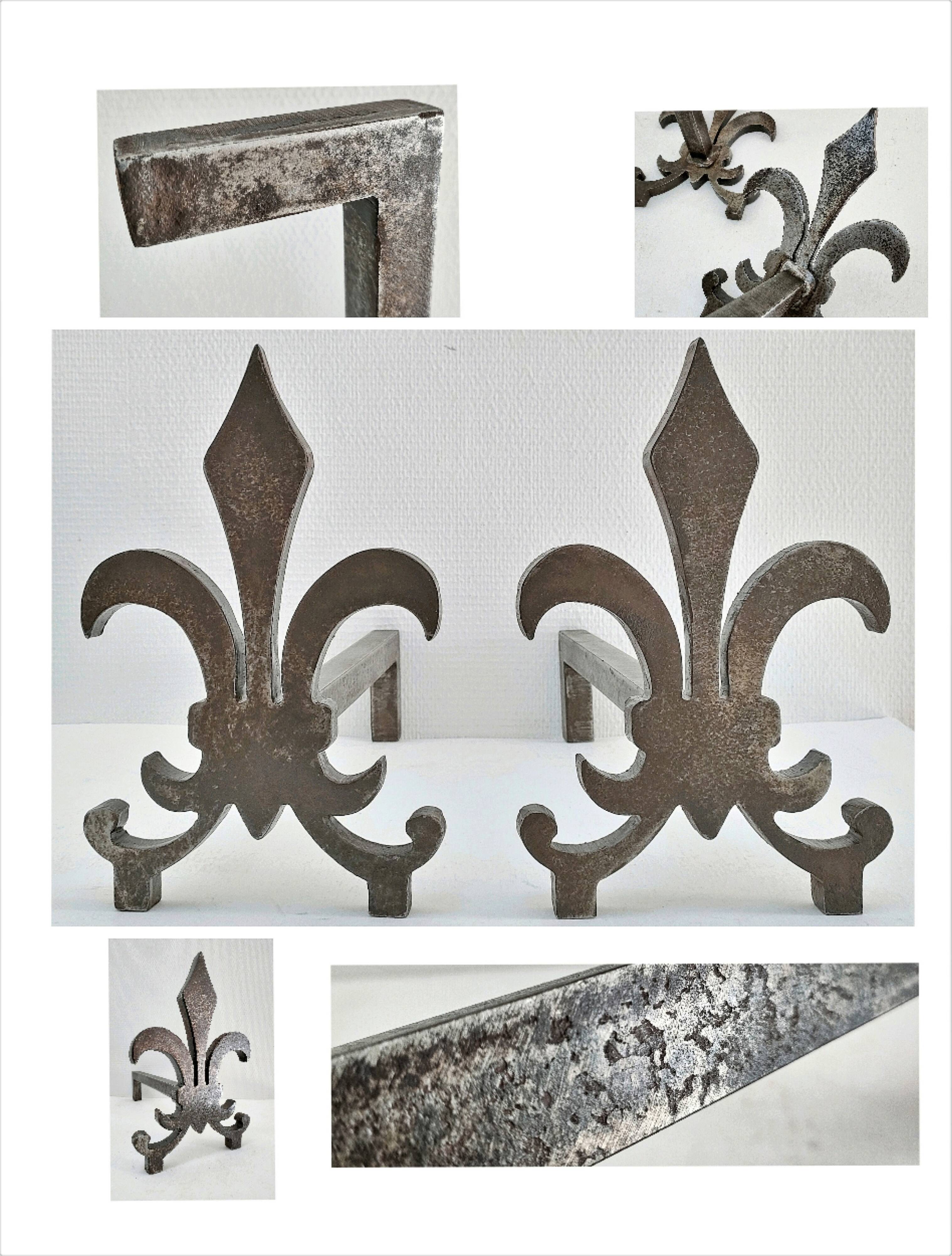 Pair of vintage steel fleur-de-lys andirons