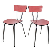 Pair of red Formica chairs with chrome legs